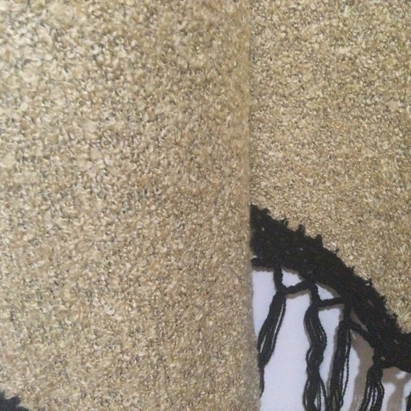 Beautiful wrap by Wind River. Measures 70” across by 30”. Gold with black fringe - Picture 2 of 2